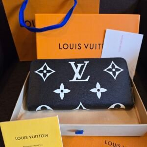 Louis Vuitton cartera con cierre lona Monogram a gran escala