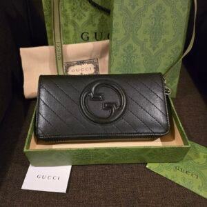 Gucci cartera Blondie piel negra con emblema G redondo