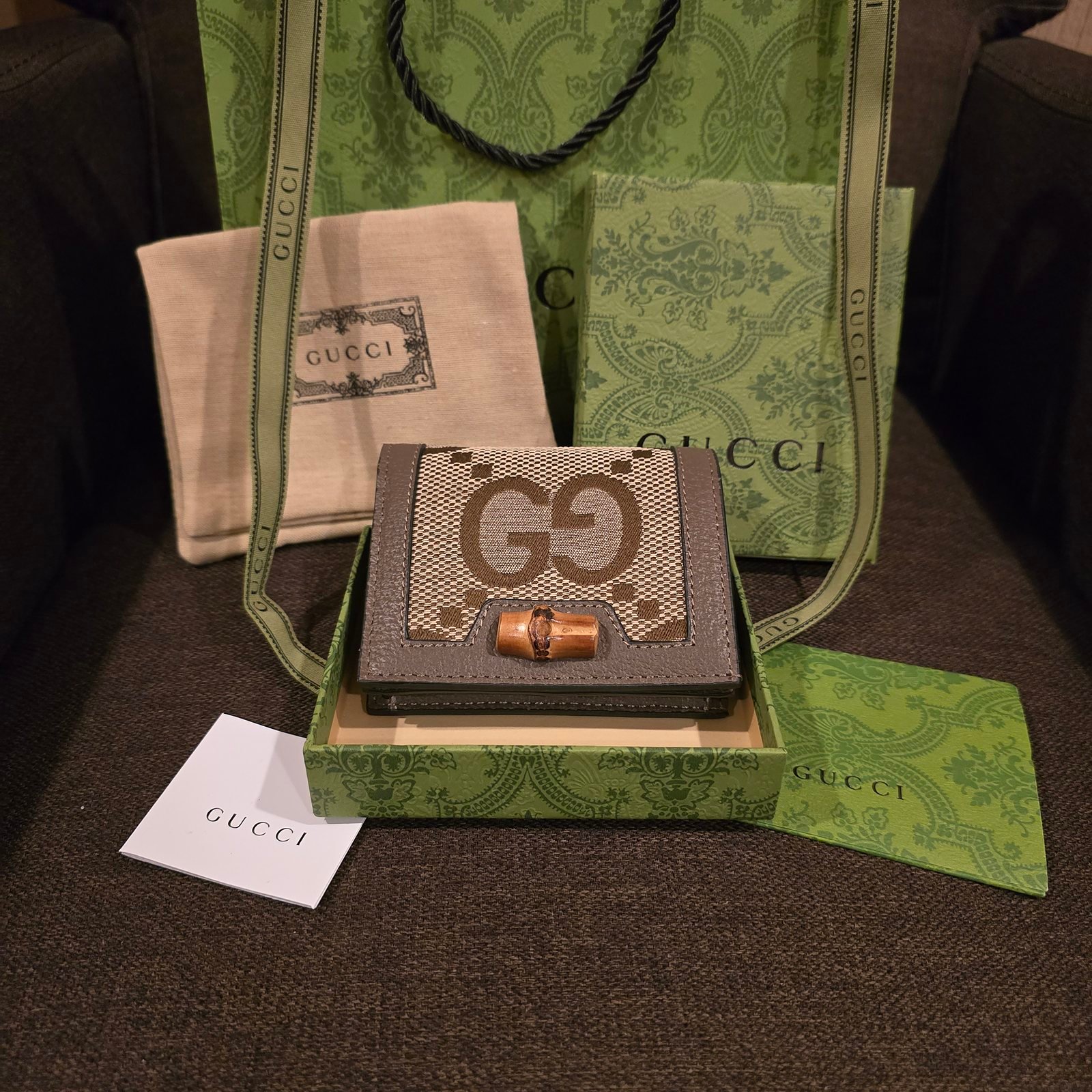 Gucci cartera lona GG Supreme con detalle de bambu