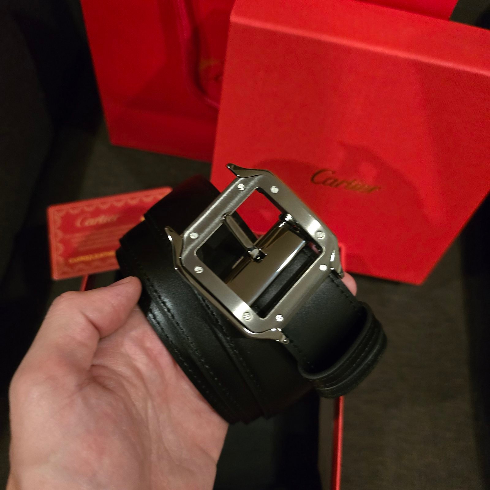 Cartier cinturón Santos reversible negro en dos texturas hebilla gunmetal - Imagen 3